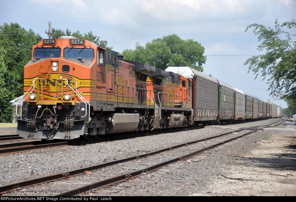 Vehicle train rolls west after crew change